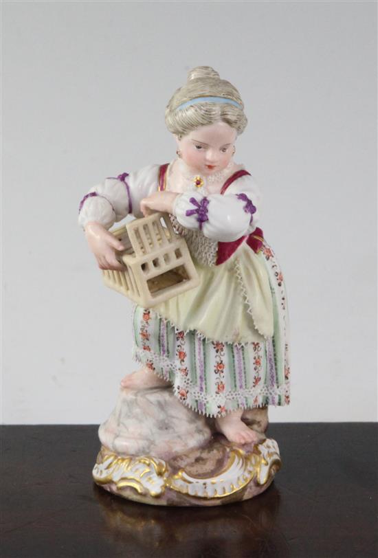 A Meissen figure of girl holding a birdcage, 19th century, 11.5cm